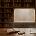 A_visually_arresting_library_i_Nano_Banana_Pro_74714 1 - VeyrZest.com Library study scene with wooden shelves, an open book and a tablet showing UNAVAILABLE on the desk