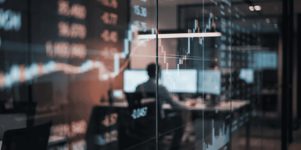 - VeyrZest.com Trading room with glass walls and multiple screens showing stock charts and numbers, a blurred silhouette at a desk in the background.