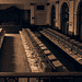 - VeyrZest.com Historic computer lab with rows of beige CRT monitors and keyboards in a grand arched-room setting