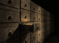 Row of old metal drawers in a vault with one drawer pulled out, revealing glowing gold coins inside.